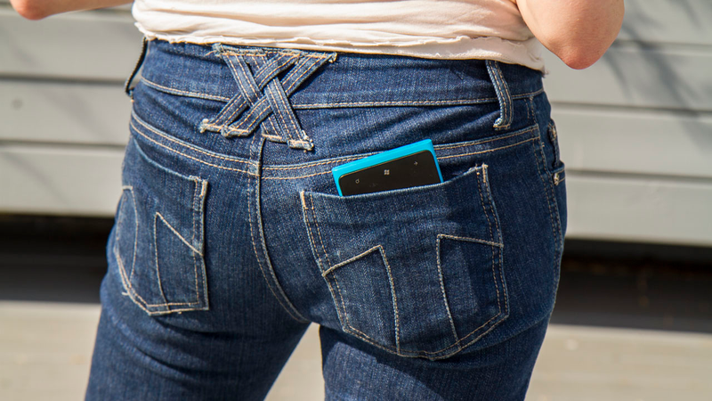 Illustration for article titled Giant Smartphones in Skinny Jeans: A Photoshoot